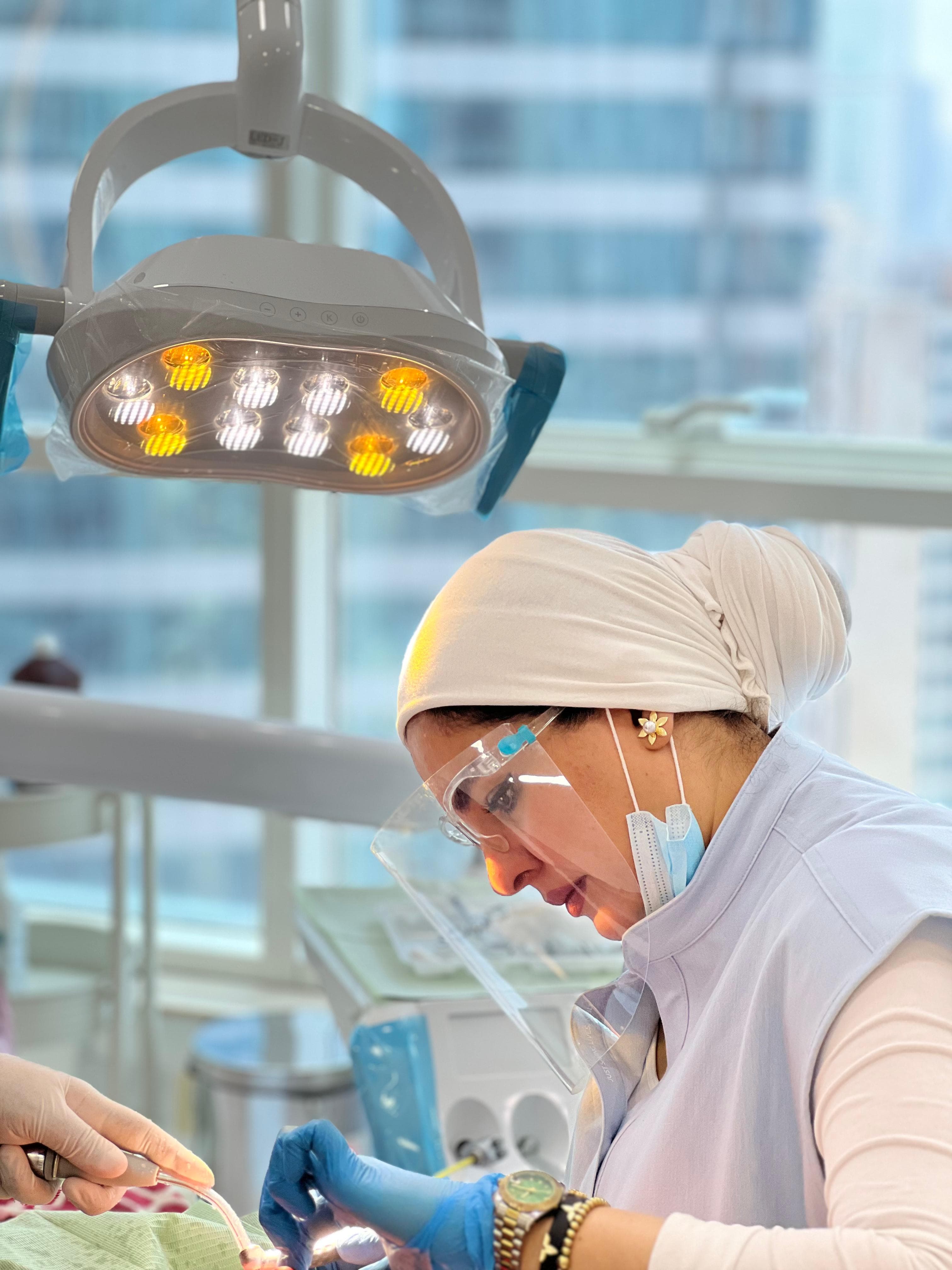زراعة الأسنان + تاج الزركون - Healthcare service image